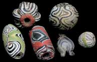 EARLY ISLAMIC PERIOD DOUBLE-FOLDED, FIRE-POLISHED GLASS BEADS as featured in Ornament Magazine